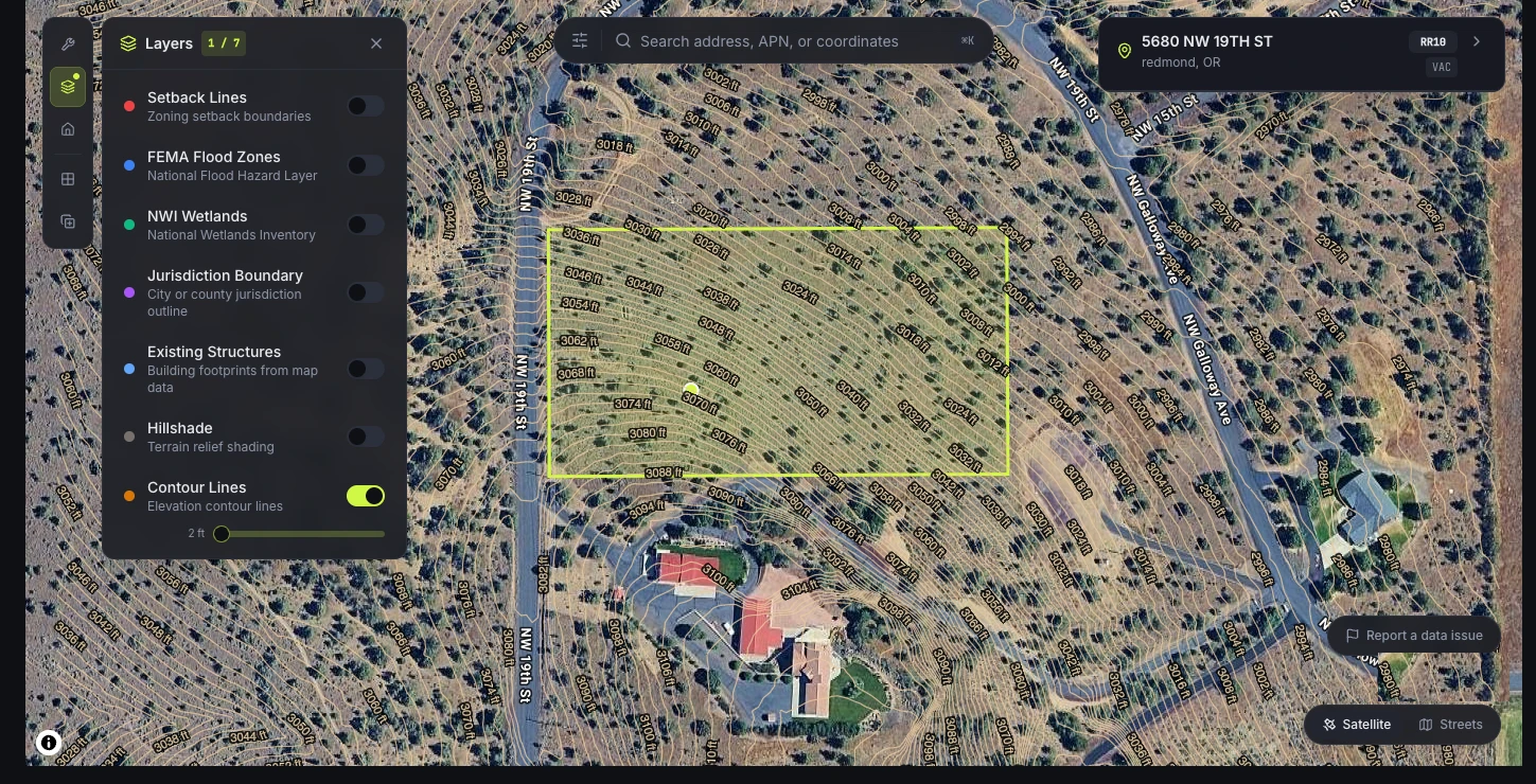 SiteFacts map with the contour layer set to two-foot increments showing slope across an outlined parcel