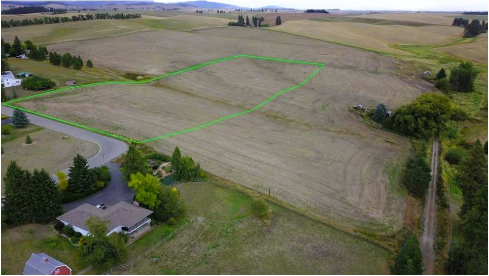 Aerial view of the 3.5-acre parcel outlined in green, inside city limits in an Eastern Washington farming town